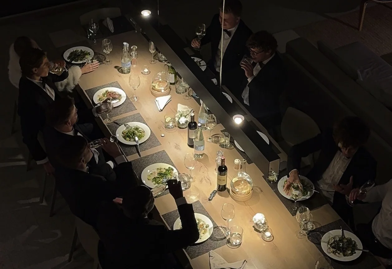 The founding table from above, mid-service