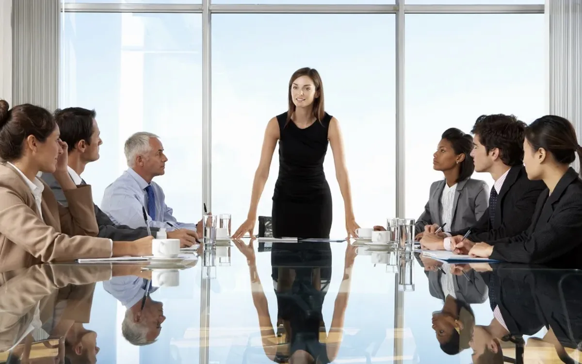 An executive leading a boardroom discussion